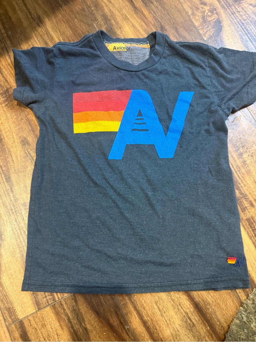 Aviator Nation Navy Short Sleeve Tee with Blue Logo & Red/Orange/Yellow Stripe